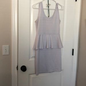 White body con dress with small skirt